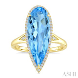 22X8 MM Pear Shape Blue Topaz and 1/5 Ctw Round Cut Diamond Semi-Precious Ring in 14K Yellow Gold
